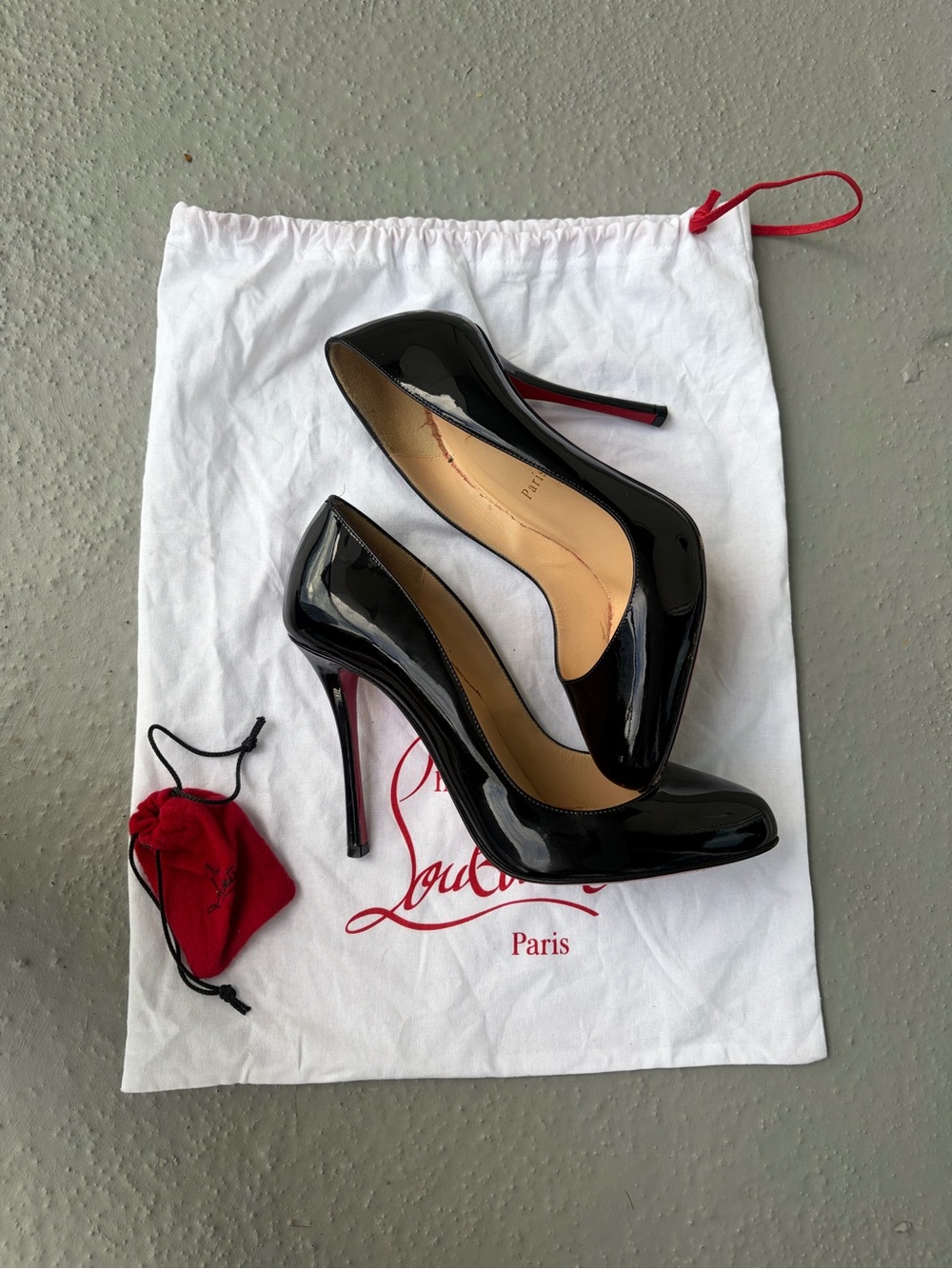 Christian Louboutin classic pattern leather pumps